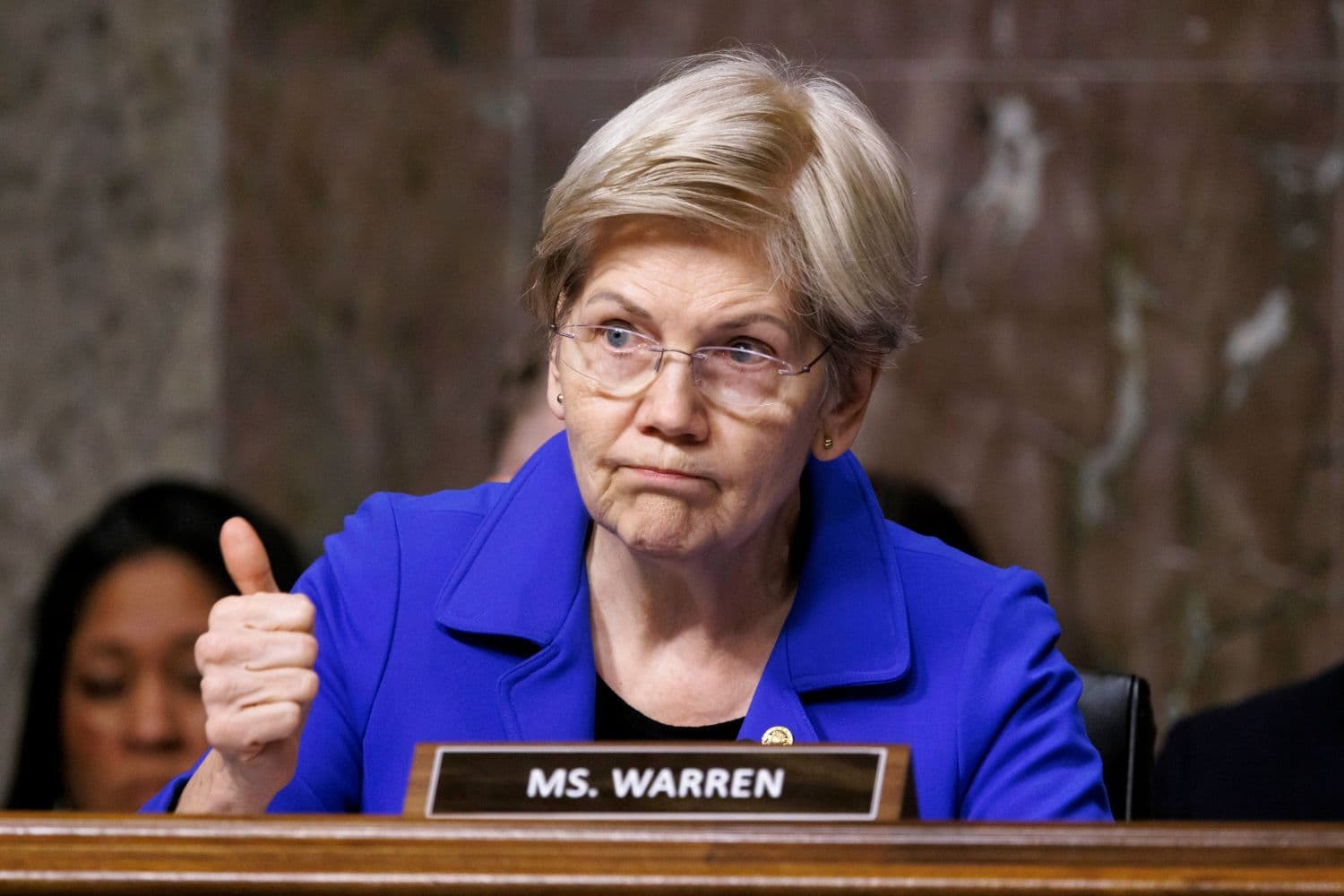 Warren Demands Answers On Bitmain Probe Tied To Trump Family