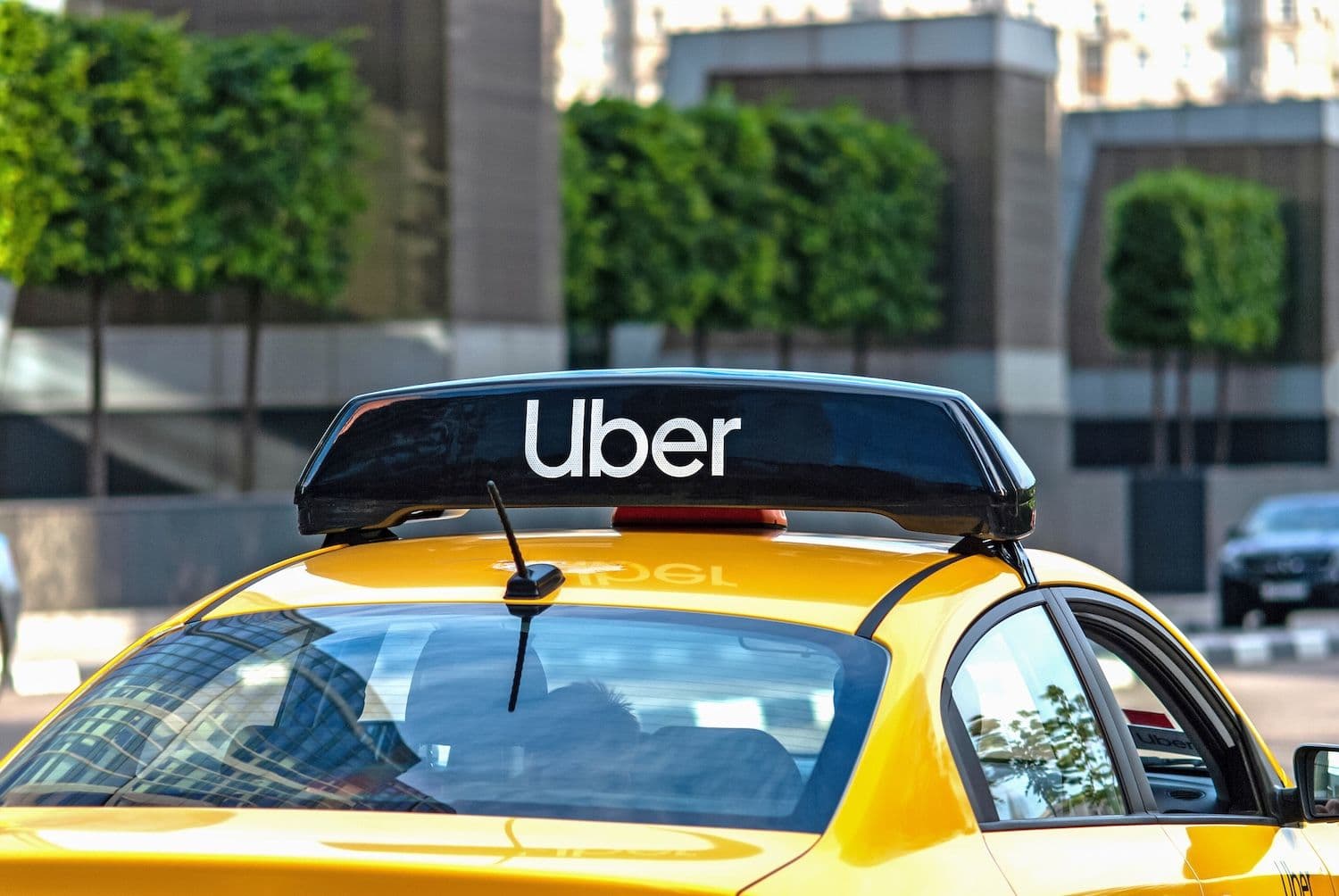 An internal memo cited a siloed structure as the ride-hailing giant removed a tenth of its customer support roles for AI. (Image: Shutterstock)