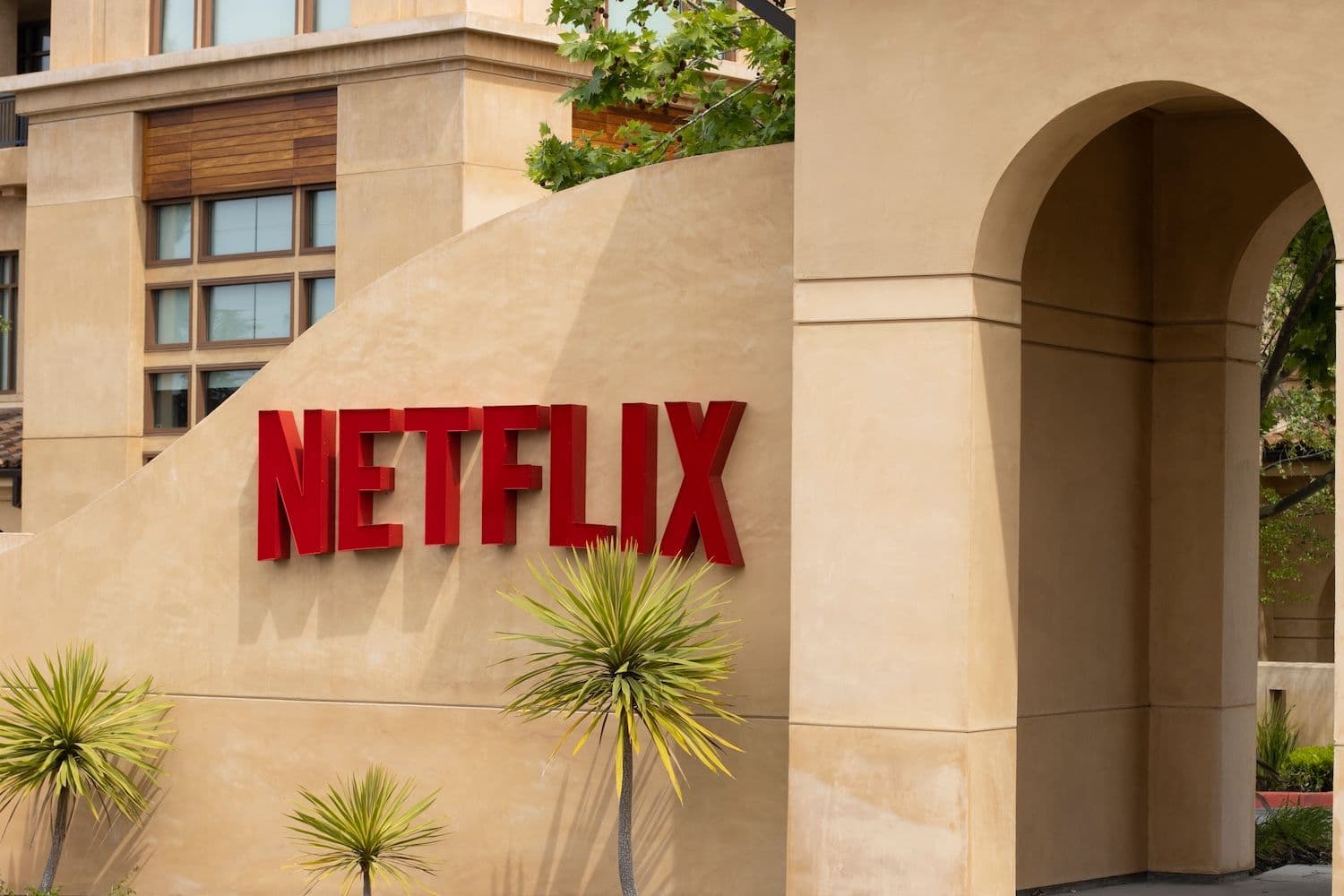 Netflix layoffs of about 1,000 jobs, announced to staff by Ted Sarandos and Greg Peters, come as YouTube and TikTok vie for viewers (Image: Shutterstock)
