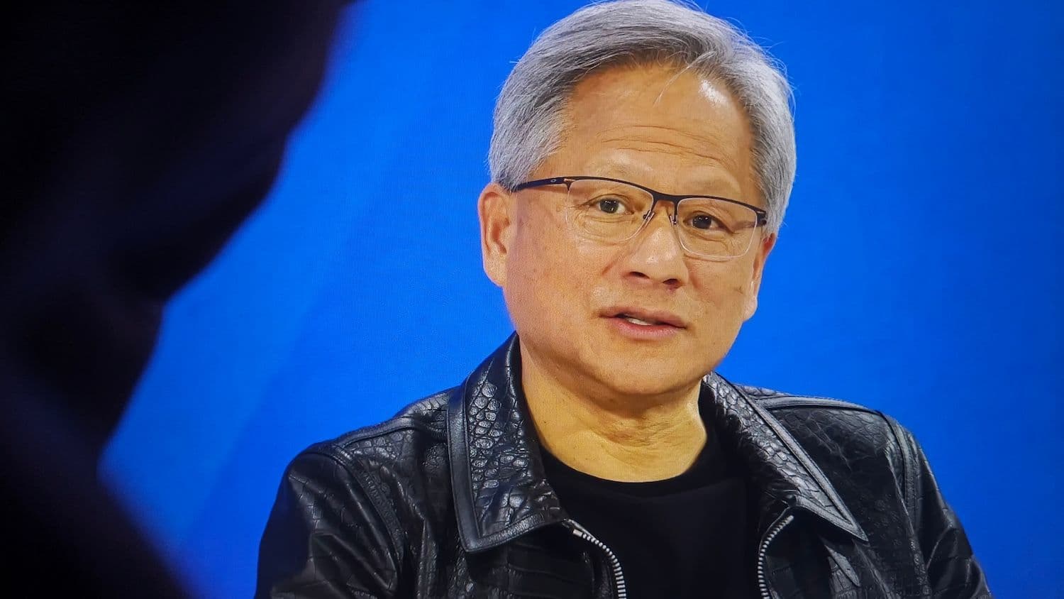 A first X post from Jensen Huang backs open-weight AI amid US scrutiny of Chinese models (Image: Shutterstock)